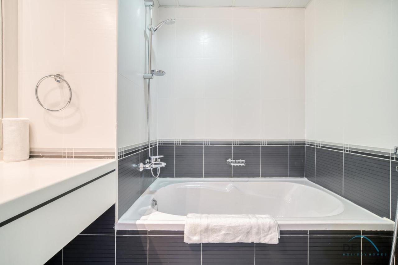 Harmonious 1br At Al Shera Tower Jlt By Deluxe Homes Dubai